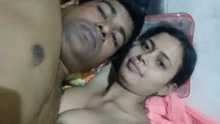 Indian wife and her husband enjoy a sensual breast play