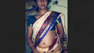 A renowned Tamil beauty unveils her creamy breasts and intimate area