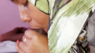 An Indian girl in hijab enjoys giving oral pleasure