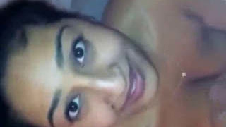 An enticing Indian woman performs a passionate oral sex act in this heated video