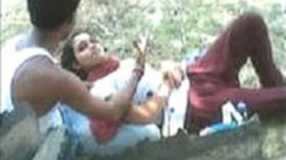 Indian lovebirds enjoy a romantic park outing