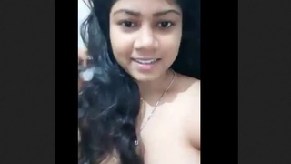 A seductive Indian woman pleasures herself in the restroom