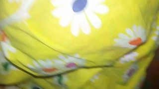 Elderly woman Sallu's leisurely stroll in the parade ground