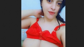 Sensual video featuring a stunning Pakistani girl with large breasts