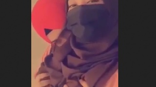 Lesbian couples explore intimacy while wearing hijabs