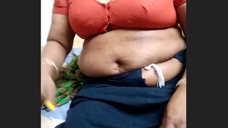 Mature auntie in blouse indulges in risqué behavior on film