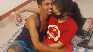 A stunning Indian woman in a swimsuit is passionately penetrated by a handsome man in a domestic setting.