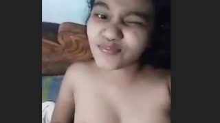 Young and adorable South Asian girl displays herself