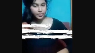 A stunning Bengali beauty reveals her curves and entices with her tightness