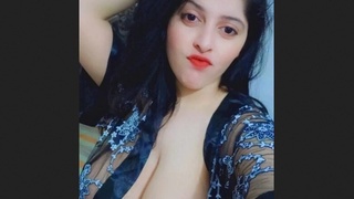 A voluptuous bhabi's intimate area is displayed in an arousing video