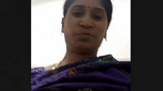 Indian matron displays her breasts during a video chat