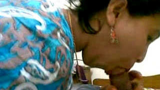 An Indian woman engages in passionate oral sex with her partner from the village