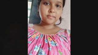 Arousing woman displays her breasts and intimate area