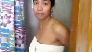 Middle-aged Indian aunt showcases her large breasts on camera