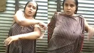 Aunty enjoys outdoor bathing in the sun