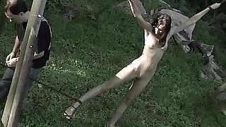 Hairy naked pussy outdoors tied and buttocks whipped