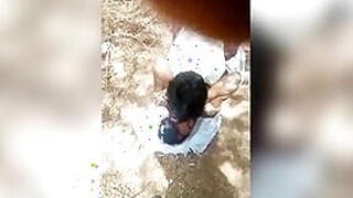 Guy lies on top of Desi girlfriend in front of the xxx cameraman in the open air