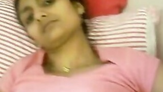 Horny Indian woman moans and jerks her pink pussy hole with her fingers
