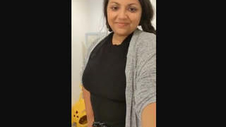 Voluptuous woman confidently displays her ample bosom and toned intimate area