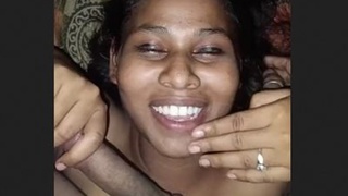 Indian wife gives a blowjob to a large penis