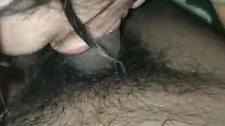 Shalu, an Indian wife, gives oral pleasure and self-pleasures while fondling a penis
