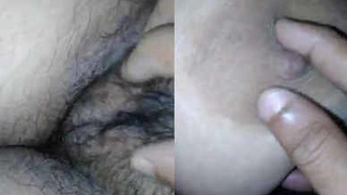 Punjabi wife with large breasts gets her hairy pussy played with by her husband