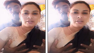 Indian bhabi's breasts on a pressing surface