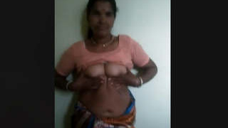 Indian housekeeper displays her breasts and intimate area