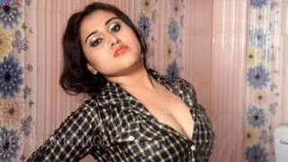 Indian college girl showcases her breasts while showering