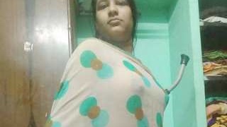 Indian village girl reveals her attractive breasts