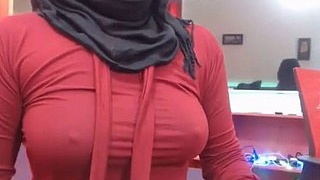 Muslim hijabi with small tits reluctantly shows off on webcam