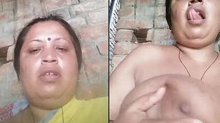 Indian aunt reveals her large breasts