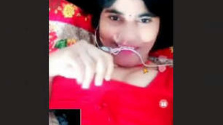 A Punjabi woman flaunts her large breasts during a video chat