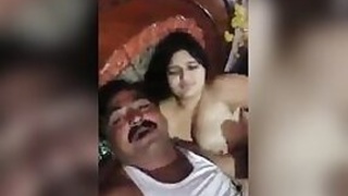 Busty aunt Desi is naked with her husband's friend.