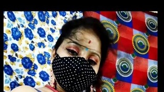 Indian wife reveals her large breasts to her lover