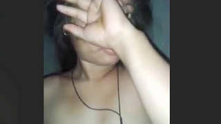 Reserved Indian woman's breasts fondled by her partner