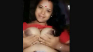 Aunty Asame's ample bosom on showcase