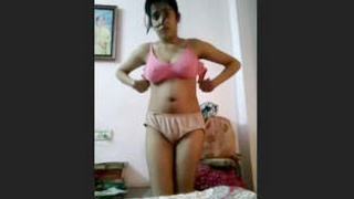 A young woman reveals her unshaved intimate area in this sensual recording