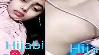 Pakistani girl in hijabi shows naked tits to her lover