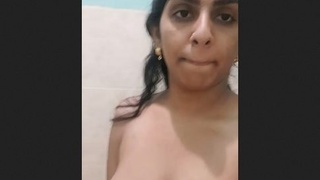 Indian woman displays her voluptuous figure in a sensual video
