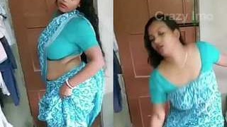 Sultry South Asian auntie performs dance routine