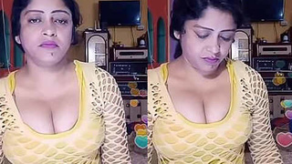 Indian aunt reveals her bosom during a live broadcast