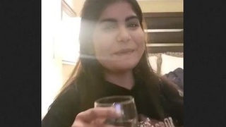 Randi chats in Hindi while flaunting her big breasts in a hotel room with a friend