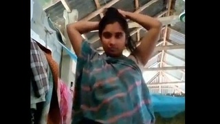 A nude Bengali woman engages in explicit acts