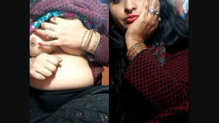 Indian wife reveals her breasts during a live performance