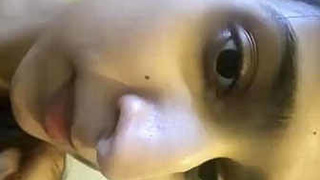 Indian girl squeezes her own breasts