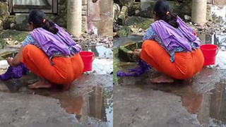 Desi wife sensually washes clothes and reveals her naked body