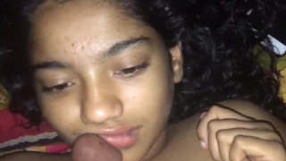 Desi girl's adorable face and skilled blowjob in video