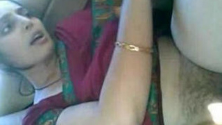 Indian homemaker gives oral pleasure to her chauffeur in a vehicle