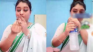 Sherni's seductive display of her bellybutton and alluring backside